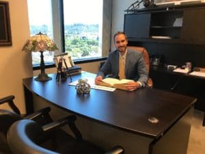 Bradley R. Corbett | San Diego Criminal Defense Attorney in his Office. Your very own Marijuana Cultivation Attorney.